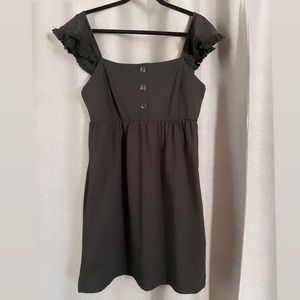 Black off the shoulder dress.